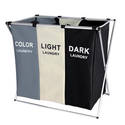 China Modern Home 3 Section Bathroom Foldable Laundry Hamper 135L Divided Dirty Laundry Cloth Hamper Bag With Aluminum Frame for sale