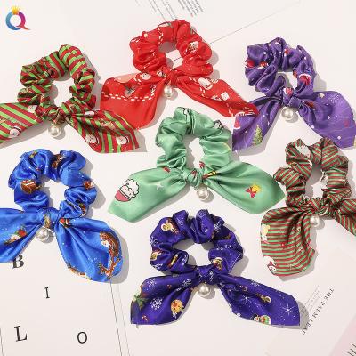 China New Hair Decoration Qiyue Fashion Christmas Cartoon Pattern Printed Silk Satin Bunny Ear Scrunchies With Pearl Pendant for sale