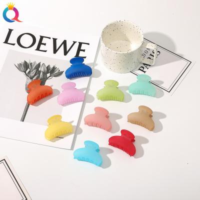 China Matte Hair Claw Clip Women's Non-slip Small Size Hair Accessories Smart Casual Soft Round Half Girl Hair Clip for sale