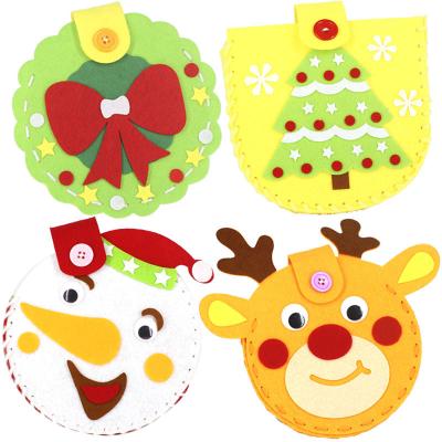 China It is suitable for kindergarten beauty work class new Christmas children's non-woven handmade bag jars Santa Claus kindergarten DIY handmade material bag for sale