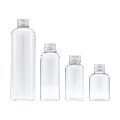 China For cosmetic water trace 50ml-250ml cosmetic packaging material oxidized bronze aluminum transparent round shoulder PET cover plastic bottle for sale