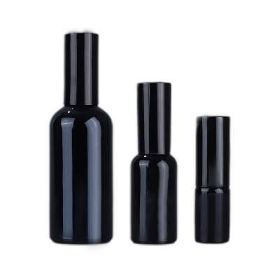 China Suitable for cosmetic packaging such as 5ml-100ml stain bottle glass matte black perfume spray bottle toners packaging material perfume essential oil cosmetic empty bottle for sale