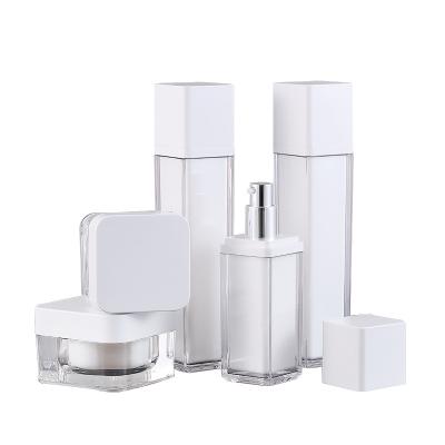 China Used for current wholesale cosmetic factory packaging material white square plastic lotion bottle acrylic cream spray set packaging. for sale