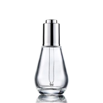 China 30ml Essential Oil Packaging Custom Material Glass Cosmetic Empty Bottle Transparent Squeezing Essence Dropper Bottle for sale