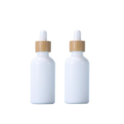 China 10ml-100ml Stain 10ml-100ml Dropper Glass Bottle Packaging Materials Jade Bottle Porcelain Wood Bamboo White Empty Cosmetic Bamboo for sale