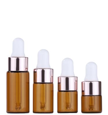 China 1ml2ml3ml5ml cosmetic cosmetic packaging materials supplied by stock, empty brown rose gold glass dropper bottles bottles for sale