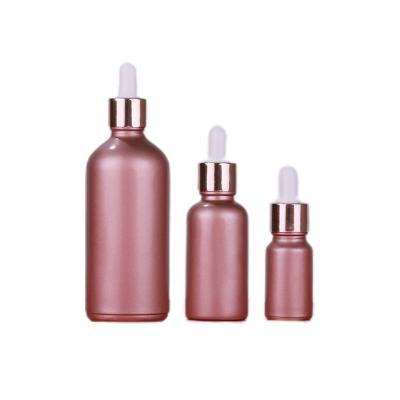 China New Stain 5ml-100ml Cosmetic Packaging Material Cosmetic Essence Empty Bottle Filled Matte Rose Gold Opaque Glass Dropper Bottle for sale