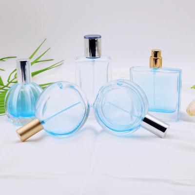 China Eco-friendly Wholesale Beautiful Perfume Container OEM/ODM Manufacturing Empty Spray 50ml Glass Perfume Bottles for sale