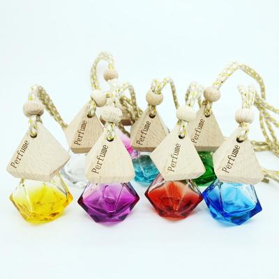 China Wholesale Eco-friendly Hanging Car Air Freshener Glass Bottle Car Empty Perfume Bottle for sale