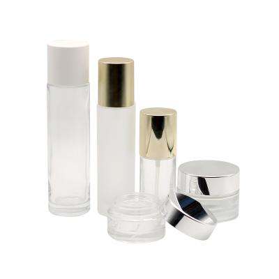 China High Quality Eco-friendly Glass Bottle and 40ml 50ml 100ml Amber Cosmetic Container Face Toner Lotion Jars Set with Gold Lids for sale