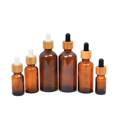 China Free Sample 5ml 15ml 30ml Hair Oil Serum Container Amber Matte Green Bamboo Dropper Glass Essential Oil Eco-friendly Empty Bottle for sale