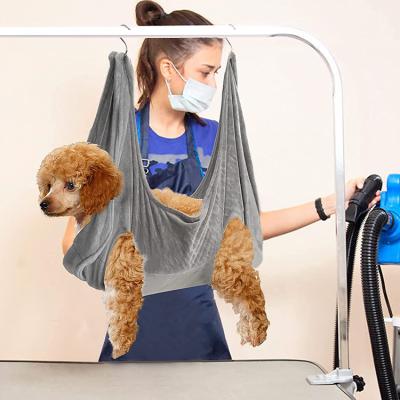 China New Design Durable Pet Grooming Hammock Pet Nail Clip Bag For Grooming Dog Cat With Hangers And Repair Pets for sale