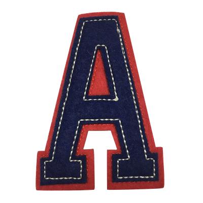 China Viable Custom Wholesale Nonwoven Applique Embroidered Letters Patch for sale