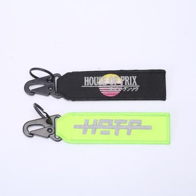 China Durable High Quality Polyester Fabric Embroidered Pendant Key Ring Embroidered Key Chain for sale