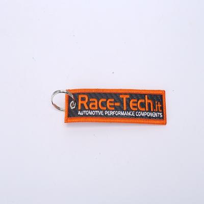 China Double Design Shape Key Chains Viable Wholesale Custom Side Cloth Tag With Machine Woven Own Name Logo for sale