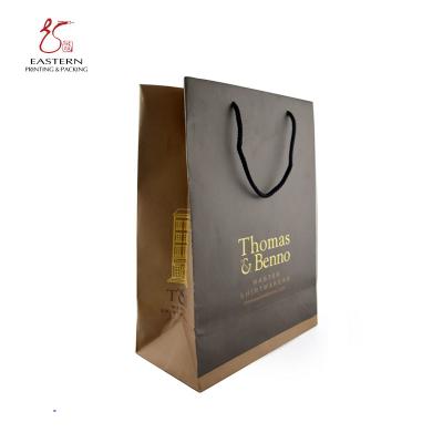 China Embossing Stamping Custom Printed Paper Gift Bags Biodegradable CMYK Color | Gift Paper Bag Manufacturer for sale