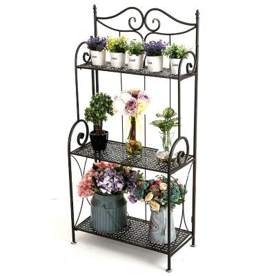 China Minimalist Home Living Room Black Iron Metal Wire Storage Wall Mounted Rack For Book Flower Hanging Decorations for sale