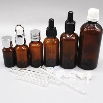 China Personal Care Glass Bottle 5ml 10ml 15ml 20ml 30ml 50ml 100ml 200ml Amber Brown Glass Dropper Essential Oil Bottle For Cosmetic Packaging for sale