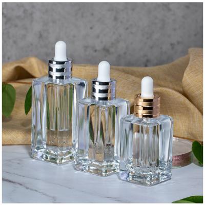 China Wholesale Cosmetic Essential Oil Packaging 50ml 75ml 100ml Serum Glass Dropper Bottles For Skin Care for sale