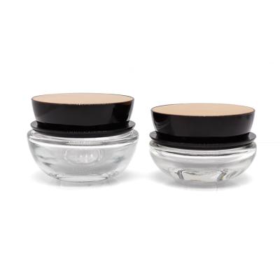 China New Style Custom Clear Oval Cosmetic Glass Container 50g Personal Care Cream Empty Jars For Packaging for sale