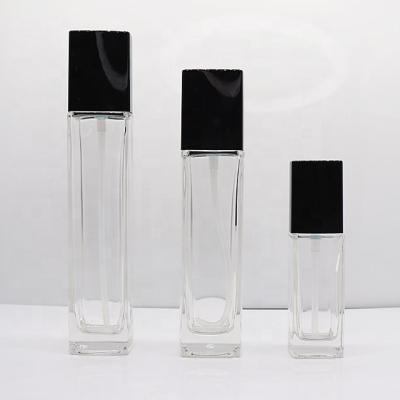 China Luxury Empty Personal Care Lotion Bottle Clear Jars Face Lotion Bottle Jars Spray Pump Glass Bottle For Serum Cosmetic Packaging for sale