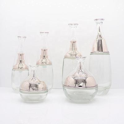 China New Recyclable Arrive Luxury Glass Cosmetic Bottles And Jars For Cosmetic 30g 50g 40ml 60ml 100ml 120ml Lotion Bottle Set Cream Cosmetic for sale