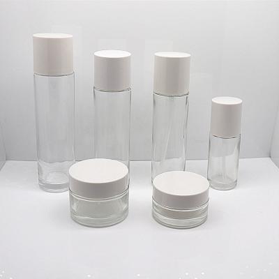 China Personal Care 30g 50g 40ml 100ml 120ml Personal Clear Glass Empty Cosmetic Packaging Cream Jar Lotion Pump Bottle for sale