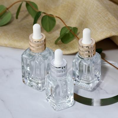 China Wholesale Cosmetic 40ml Perfume Essential Oil Serum Clear Glass Dropper Bottle For Cosmetic for sale