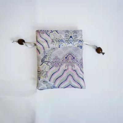 China Guangdong shipping manufacturer specializes in custom made satin package pouch, color tint fabric jewelry storage bag wholesale design for sale