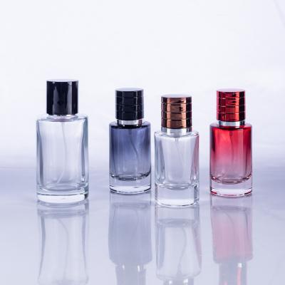 China Perfume Round Shape Wholesale 50ml 30ml Perfume Glass Bottle With Spray for sale