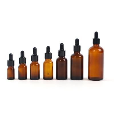 China Round 30ml Essential Oil Cosmetic Empty Perfume Amber Glass Dropper Bottles Wholesale for sale