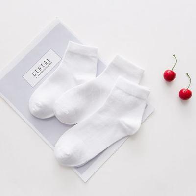 China QUICK DRY Plain White Sporty Crew Cotton Unisex Kids Basketball Socks for sale