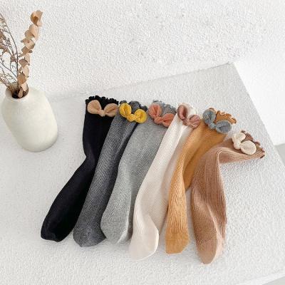 China 2022 new arrivals spring cotton knee high stockings high quality children girls colorful bow fashion sporty soft slouch big bangs kids for sale