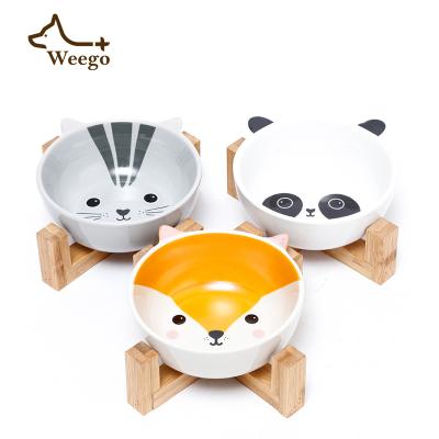 China Weego Sustainable Dog Water Bowls And Food Feeder Dish Cartoon Ceramic Dog Bowls With Stand Stoneware Wooden Pet Bowl for sale