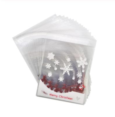 China Promotion Custom Printed Clear Christmas Gift Bag Self Adhesive Cellophane Plastic Packaging Bag for sale