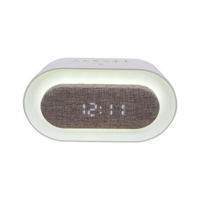 China LED Bluetooth Flashing Light Speaker with Alarm Clock and Night Light for Bedroom Use for sale