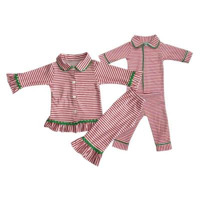 China Anti-wrinkle Boutique Clothing Outfits Christmas Pajamas Matching For Girl And Boy Items for sale