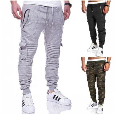 China Breathable Mens Hip Hop Joggers Pants Solid Multi-pocket Pants Sweatpants for sale