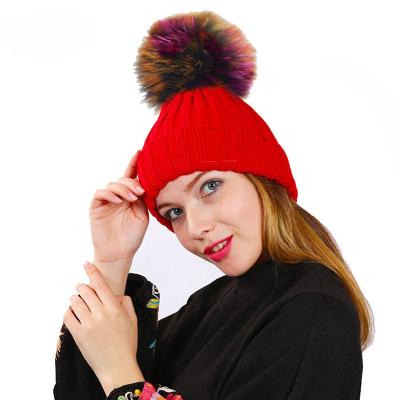 China 2021 Winter Knitted COMMON Beanie Hats With Colorful Raccoon Fur Pompom Ball For Women Lady Girls Feminine for sale