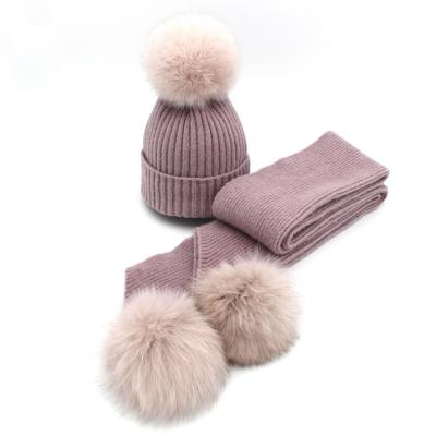 China 2022 COMMON hot sale cheap fox fur ball hat real scarf set chunky classic fashion knit hat with fur ball for sale