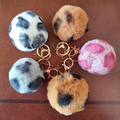 China 2022 Wholesale 8cm Fashion Leopard Print Cute Fluffy Synthetic Auto Fur Ball Faux Fur Fox Fur Pompom for sale