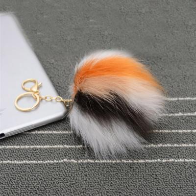 China Faux Fur Ball Pompom Chains 2021 Hot Sale Mixed Colors Pretty Stuffed Faux Fur Ball Animals Plush Key Chain Key Chain for sale