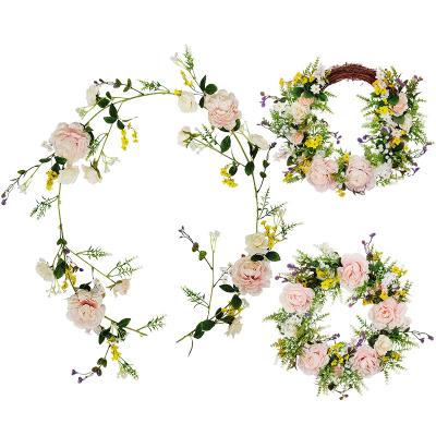 China 2021 new design fabric and rattan artificial rose flower garland rose color style for wedding home decoration for sale