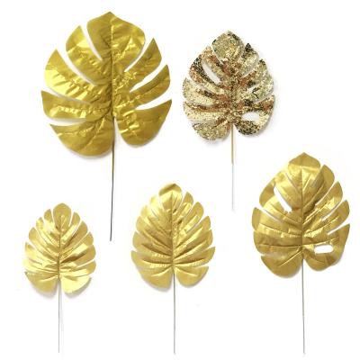 China Wedding& Home& 2021 Artificial Eucalyptus Festival Maple Silver Leaf Turtle Gold Leaf Palm Leaf Office Decoration Flower Plants Wedding Decoration Gift for sale