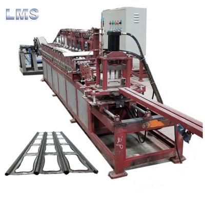 China Perforated Door Shutter Art Hollow Out Rolling Door Shutter Roll Forming Machine Te koop