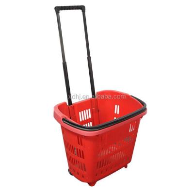 China Plastic Shopping Basket On The Wheel Supermarket Shopping Cart Trolley for sale