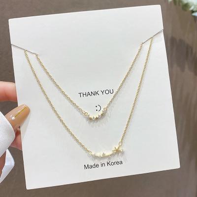 China FASHIONABLE Luxurious Exquisite Titanium Steel Women's Double Layer Zircon Star 18K Clavicle Chain Gold Plated Jewelry for sale