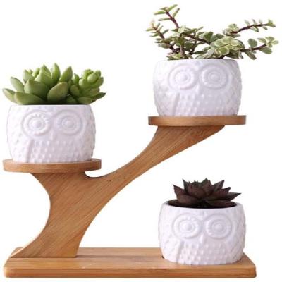 China Eco-friendly unique home decoration pot rack flower wooden pot stand for sale