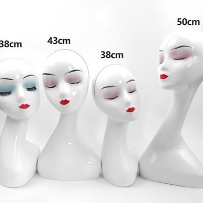 China Other Cheap Plastic Head Wig Abstract Display Hat And Mannequin for sale