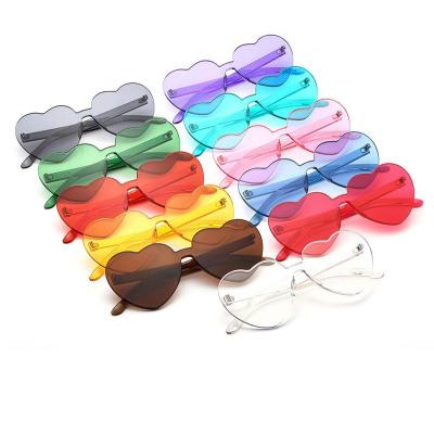 China Wholesale Custom Round Colored Round Custom Made PC Frameless Candy Eyewear Sun Glass Heart Shape Rimless Fashionable Loving Sunglasses for sale